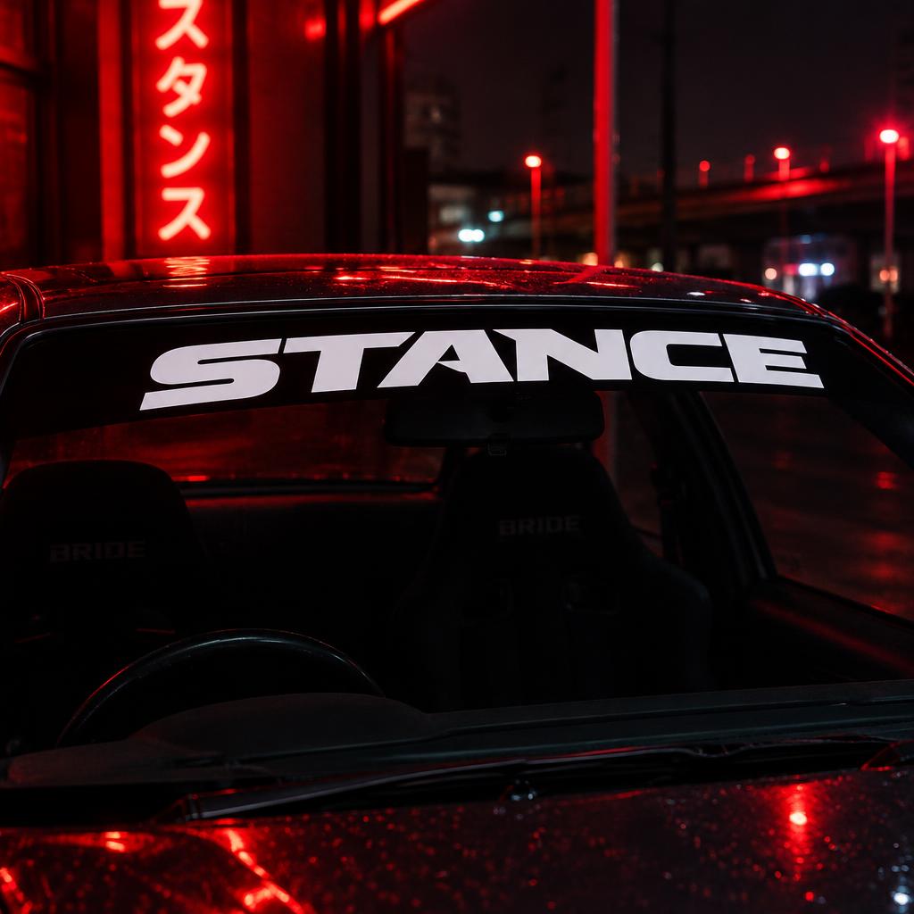 STANCE windshield banner on a car